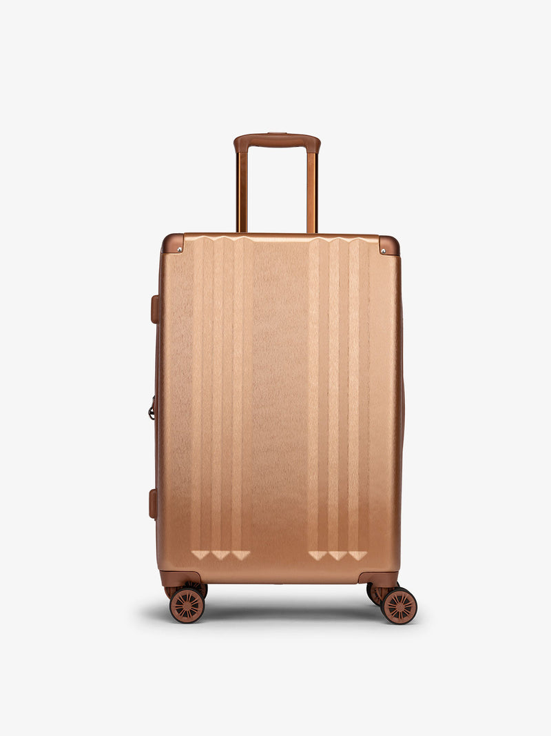 CALPAK Hard shell medium luggage as part of the Ambeur luggage set in copper