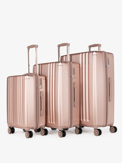 CALPAK Ambeur: 3 piece lightweight expandable rose gold hardside spinner luggage set for women; LAM3000-ROSE-GOLD view 1