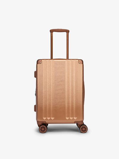 Front-facing image of CALPAK Ambeur carry-on luggage with 360 spinner wheels in copper; LAM1020-COPPER view 1