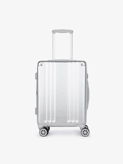 Studio product shot of front-facing lightweight silver CALPAK Ambeur 22-inch hardside rolling spinner carry-on luggage; LAM1020-SILVER view 1