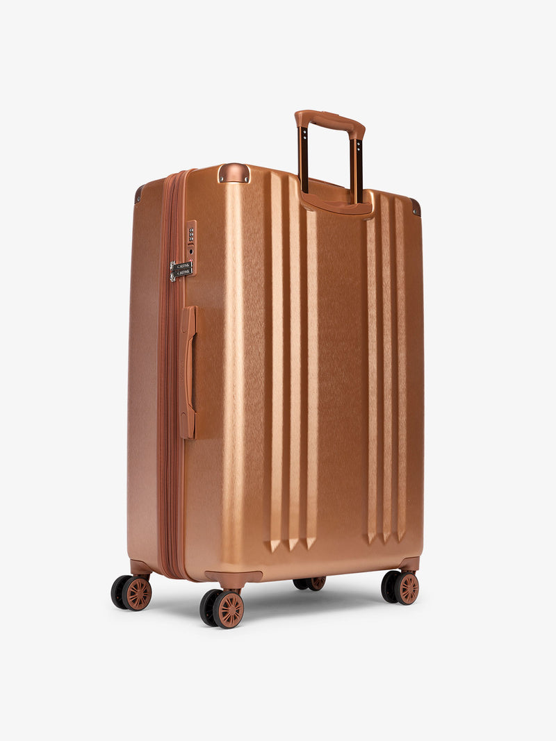 CALPAK Large 30 inch lightweight hard shell suitcase in copper