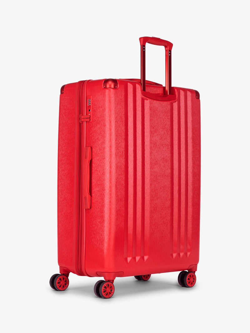 CALPAK Large 30 inch lightweight hard shell suitcase in metallic red