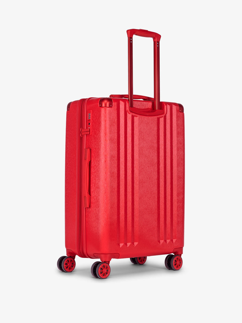 CALPAK Ambeur medium 26 inch hard shell rolling suitcase in metallic red