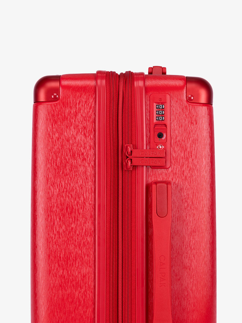 CALPAK Ambeur gold medium sized expandable suitcase with built-in TSA lock in metallic red