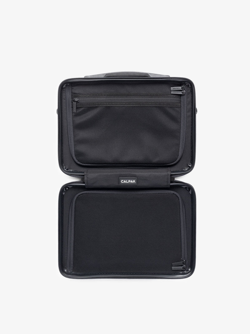 Top view of opened CALPAK black travel vanity case