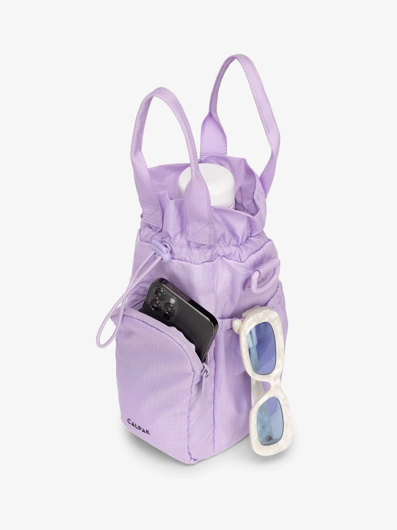 water bottle bag in lavender purple with phone and sunglasses