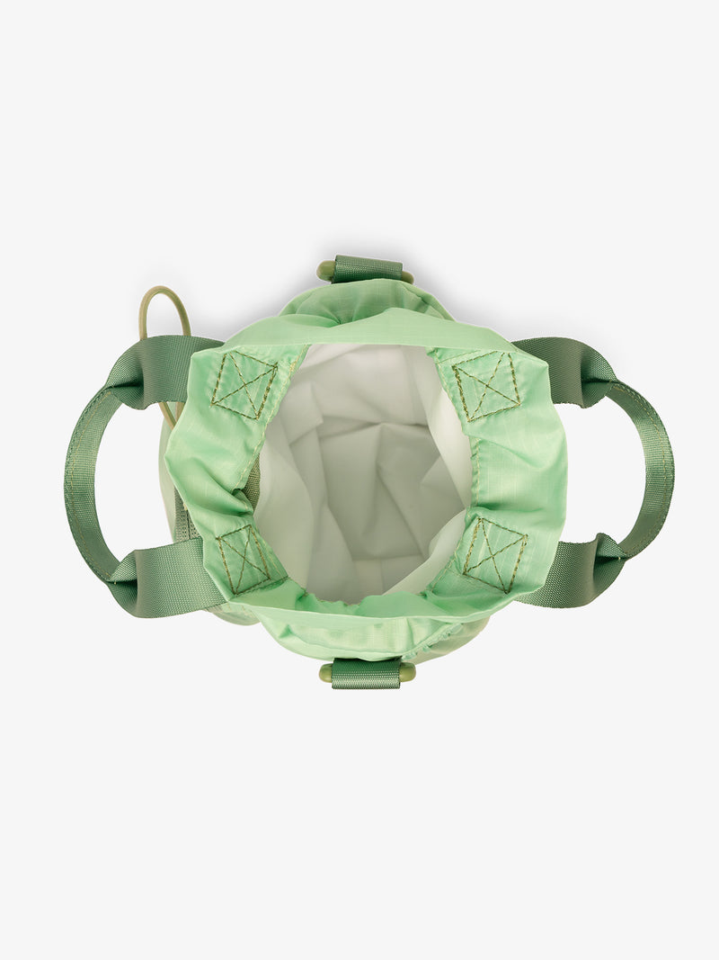 Top view with white inside fabric of CALPAK Water Bottle Holder in green ombre Matcha