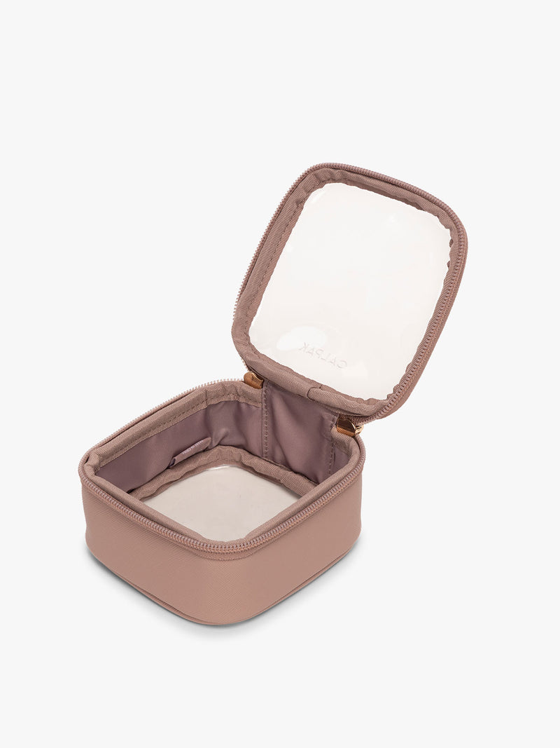 CALPAK Tiny Clear Cosmetic Case in light pink Mauve opened with zipper
