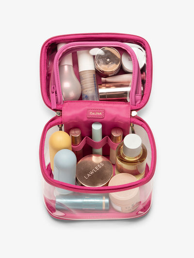 CALPAK clear train case with top interior pocket for makeup and cosmetics in dragonfruit pink