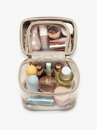 CALPAK clear train case with top interior pocket for makeup and cosmetics in stone beige