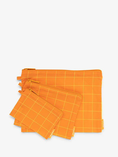 CALPAK Compakt zippered pouches in orange grid; KZB2001-ORANGE-GRID view 1