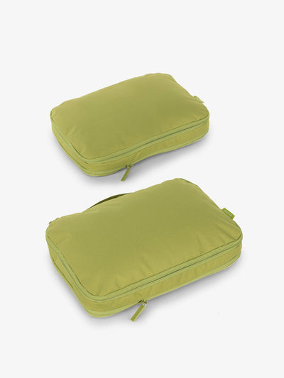 CALPAK compression packing cubes in plam; PCC2201-PALM view 1