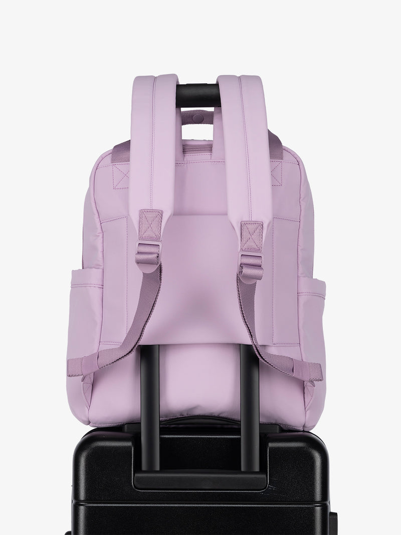 Luggage trolley sleeve of CALPAK Connect Laptop Backpack in purple