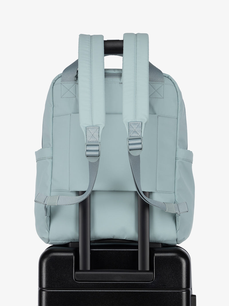 Luggage trolley sleeve of CALPAK Connect Laptop Backpack in blue