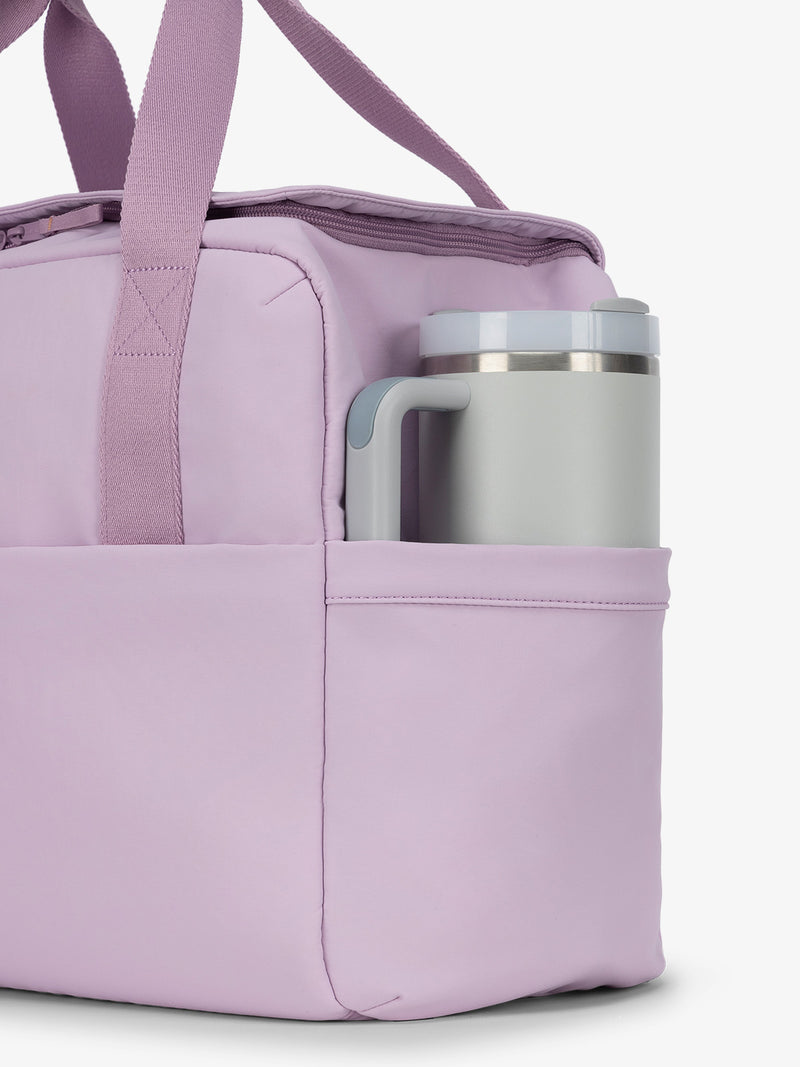 CALPAK Connect laptop duffel with large side water bottle pocket in purple