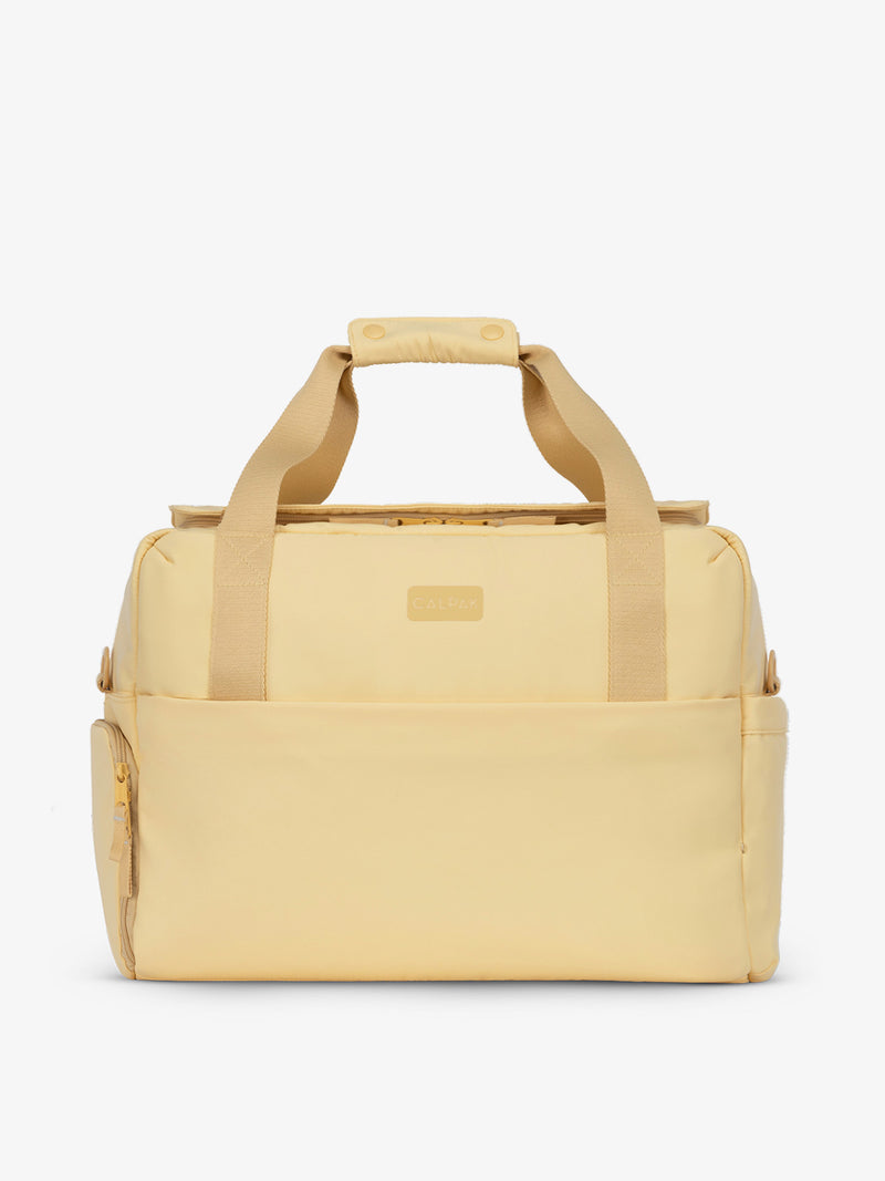 CALPAK Connect Laptop Duffel made with recycled exterior material in sunshine