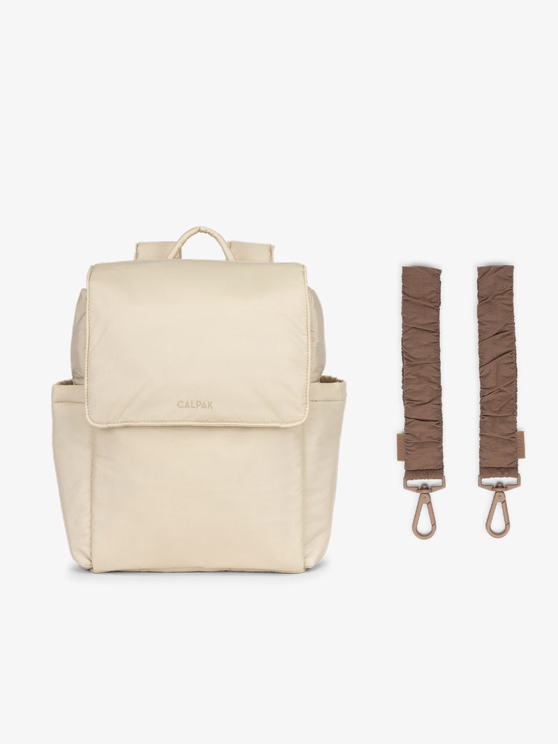 CALPAK Convertible Mini Diaper Backpack in white Oatmeal with Brown Hazelnut Stroller Straps