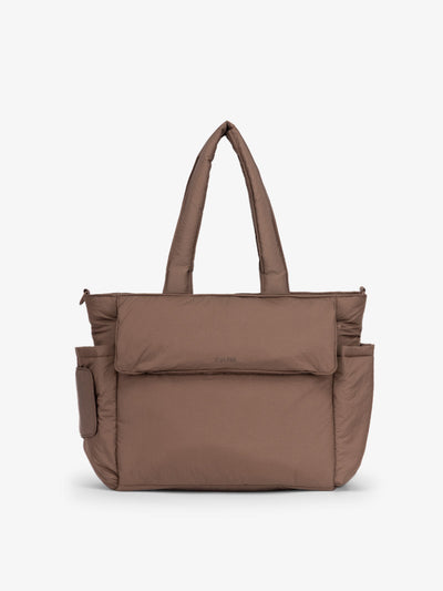 CALPAK Diaper Tote Bag with Laptop Sleeve made with durable, recycled, water-resistant material and a magnetic front pocket closure in hazelnut; TBB2401-HAZELNUT
