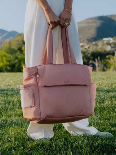 CALPAK Diaper Tote Bag with Laptop Sleeve made with durable, recycled, water-resistant material and a magnetic front pocket closure in peony; TBB2401-PEONY view 2