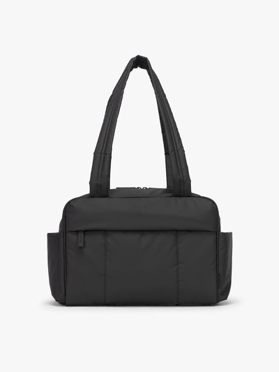 CALPAK Mini Duffel in black front view with puffy exterior, interior and exterior pockets, and padded shoulder straps; DLM2501-MATTE-BLACK view 1