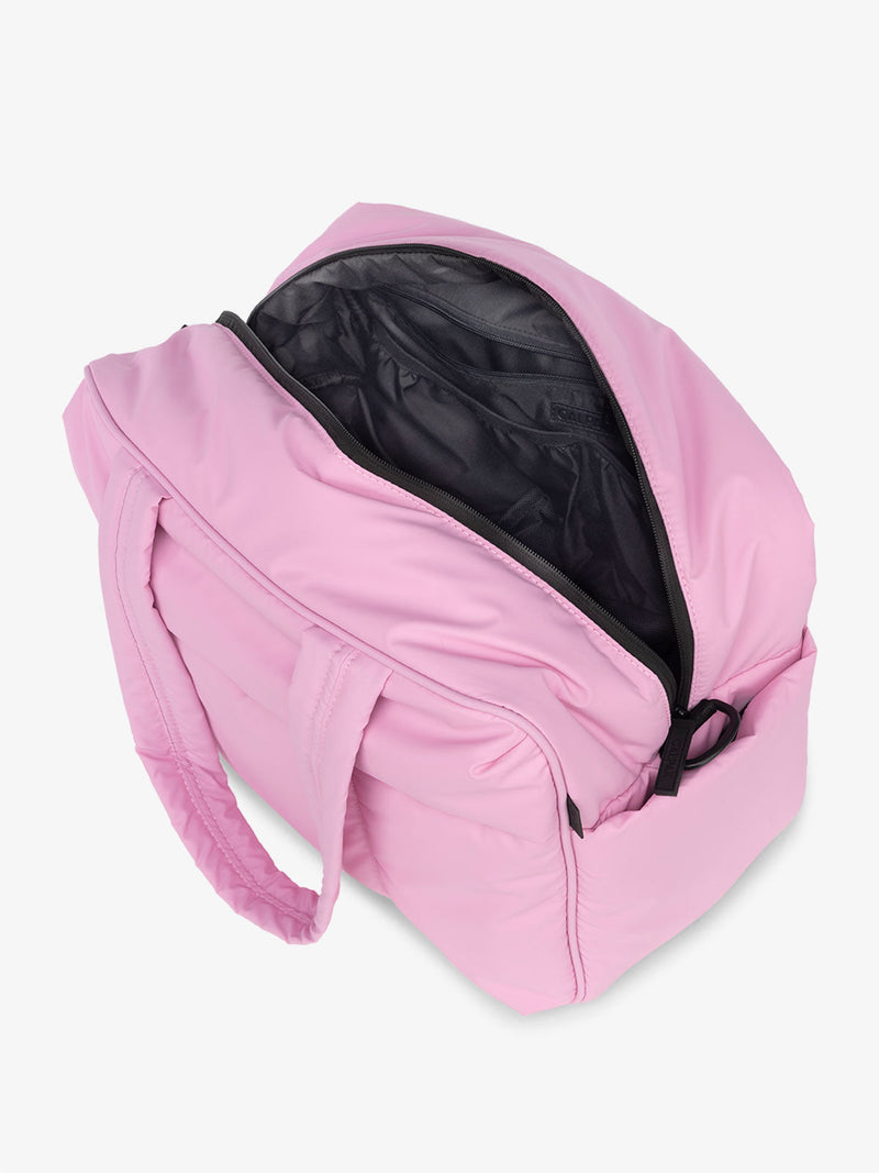 CALPAK Water Resistant Luka Duffle Bag with multiple pockets in bubblegum pink