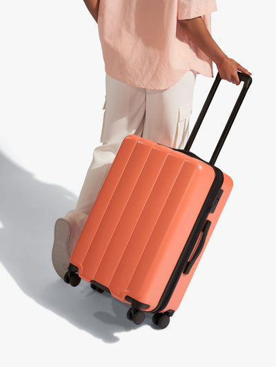 CALPAK Persimmon medium luggage made from an ultra-durable polycarbonate shell and expandable by up to 2; LCO1024-PERSIMMON view 2