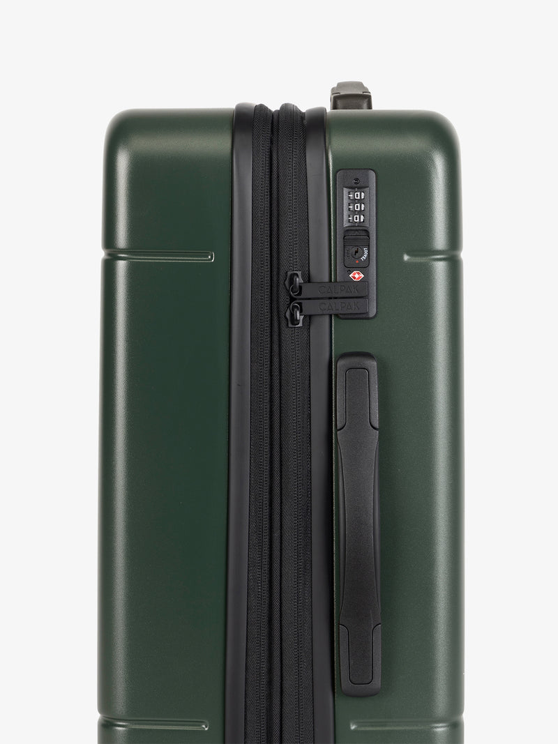 CALPAK Hue Carry-On Luggage side view of TSA-friendly lock in hard shell in green emerald