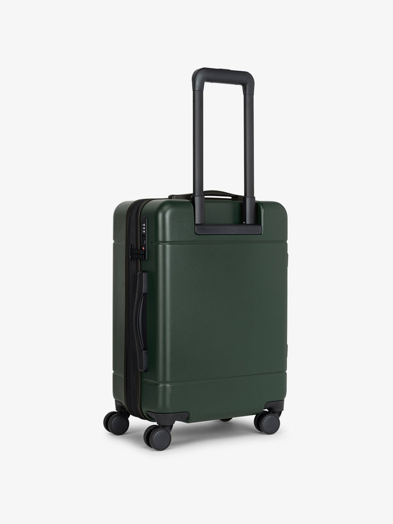 CALPAK Hue Front Pocket Carry-On Luggage back view with telescopic handle in green Emerald