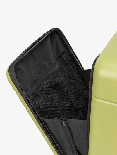 CALPAK front pocket compartment of carry-on hardshell luggage in key lime