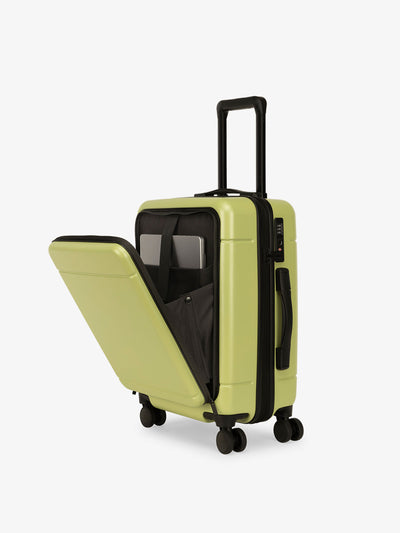 CALPAK Hue carry-on hard shell luggage with front pocket in green key lime