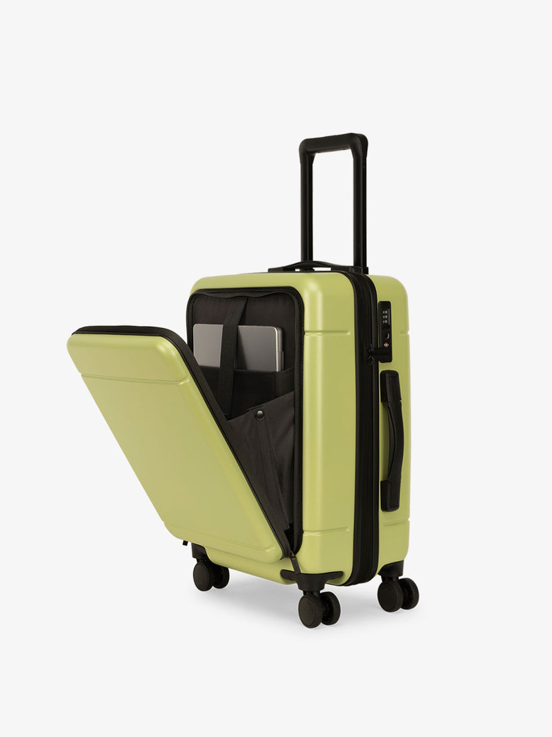 CALPAK Hue carry-on hard shell luggage with front pocket in green key lime