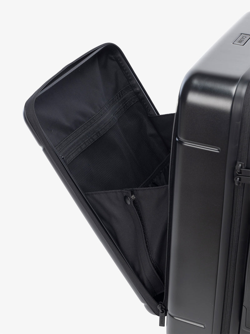 the laptop compartment of CALPAK Hue carry-on suitcase in black color