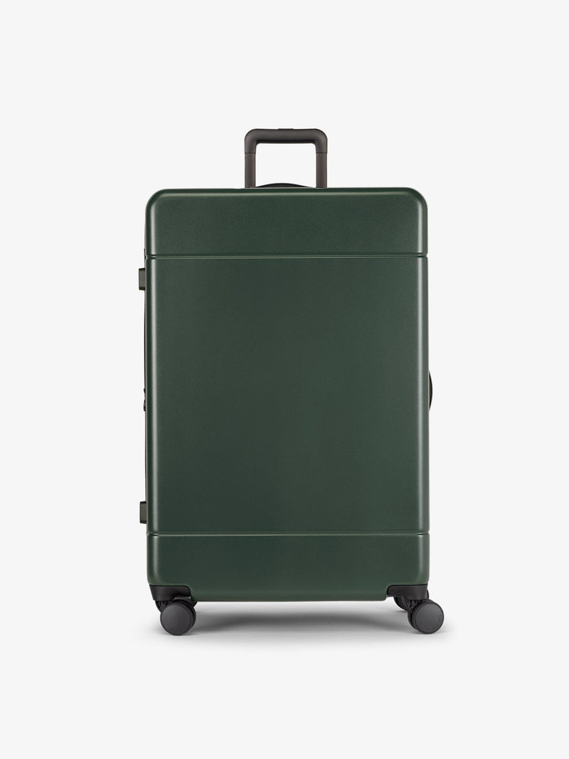 CALPAK Hue Large 30 inch hard shell Luggage front view in green Emerald