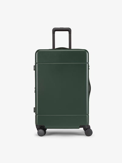 CALPAK Hue Medium 26 inch hardside Luggage front view in green Emerald; LHU1024-EMERALD view 1