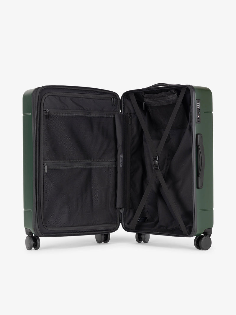 CALPAK Hue Medium 26 inch hardside Luggage opened interior in green Emerald