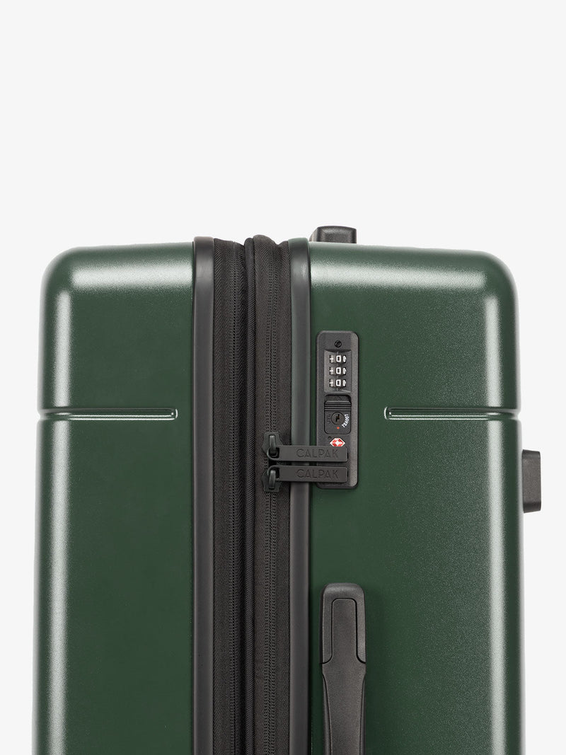 Dark green CALPAK medium trunk luggage with TSA accepted lock