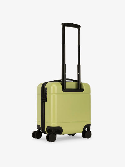 Green CALPAK hue mini carry on luggage with telescopic handle