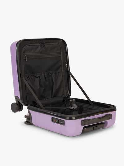 CALPAK Hue small carry-on featuring compression straps in purple orchid