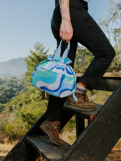 CALPAK Insulated reusable Lunch tote with drawstring closure for picnics in groovy blue