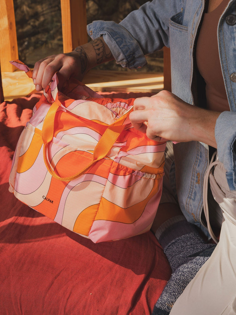 CALPAK Insulated water resistant interior Lunch tote for women in retro sunset