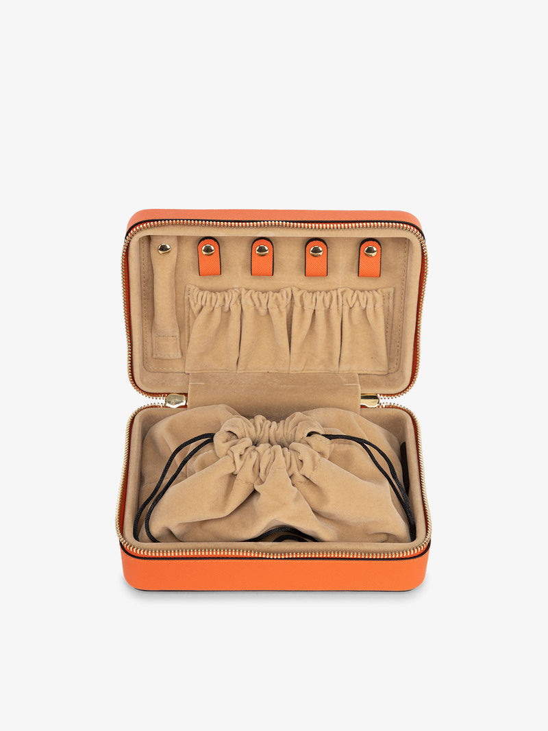 CALPAK travel jewelry box for women with drawstring pocket in papaya orange