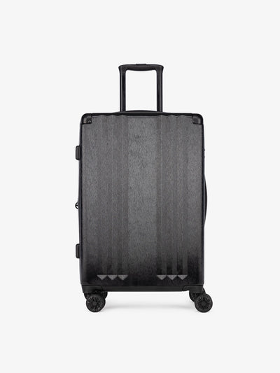 Studio product shot of front-facing CALPAK Ambeur black medium 26-inch lightweight hardshell rolling luggage; LAM1024-BLACK