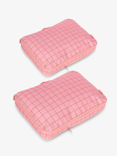 CALPAK Large Compression Packing Cubes in pink and red grid print; PCL2301-PINK-GRID view 1