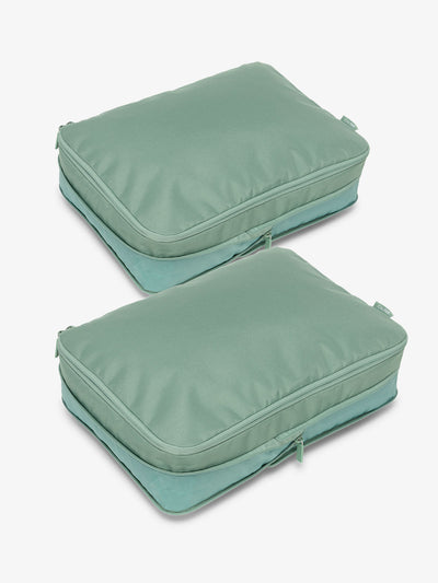 CALPAK large packing cubes with top handles and expandable by 4.5 inches in green sage