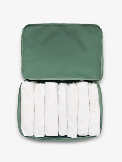 CALPAK Large Compression Packing cubes for travel made with durable materials in sage green