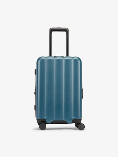 CALPAK Pacific blue carry-on luggage made from an ultra-durable polycarbonate shell and expandable by up to 2"