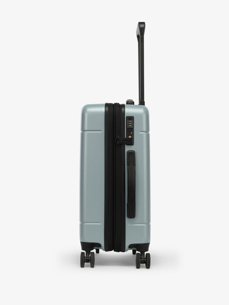 Side view of the CALPAK Hue Carry-On Luggage in blue Bluebell