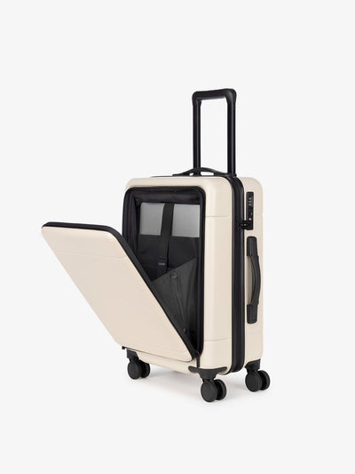 linen CALPAK Hue hard shell carry-on spinner cream luggage with laptop compartment; LHU1020-LINEN