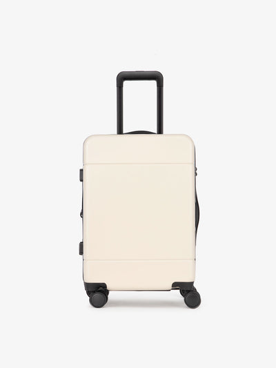 CALPAK Hue hard shell rolling carry-on luggage in linen cream color; LHU1020-NP-LINEN view 1