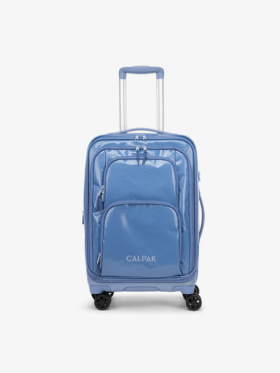 Studio product shot of front-facing CALPAK Terra Carry-On luggage with soft shell and 360 spinner wheels in glacier blue; LTE1020-GLACIER